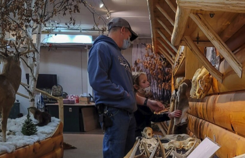 A family at the Camp Ripley Environmental Center