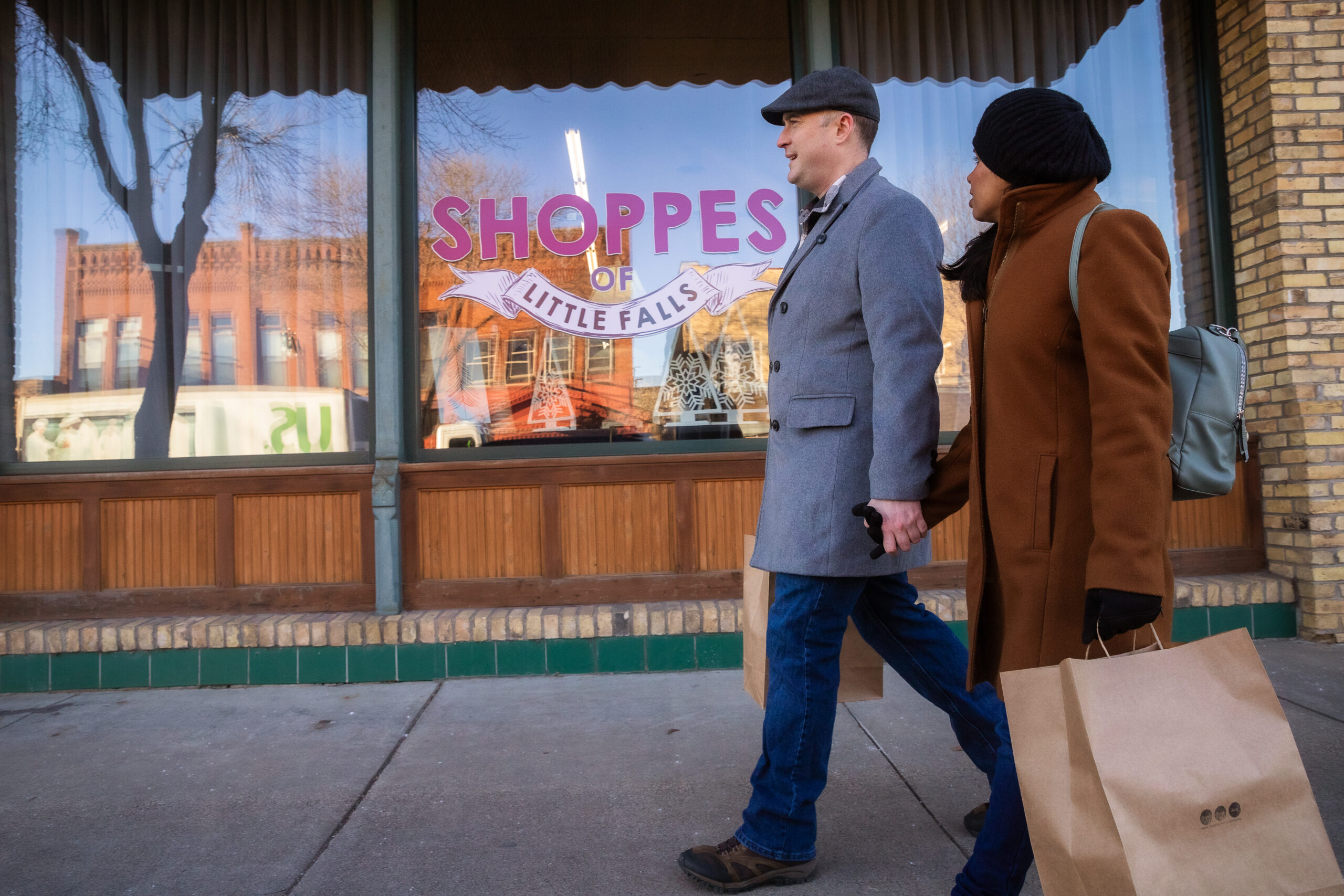 Shoppers outside of the Shoppes of Little Falls